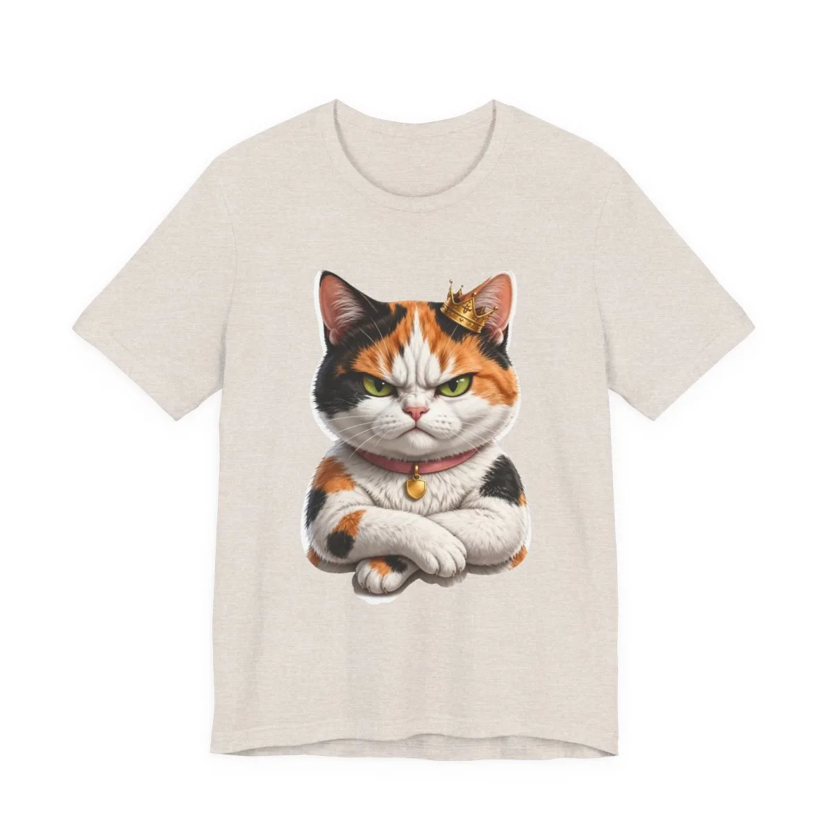 Bonnie the calico cat, thoroughly furious — the illustration printed on this tee — shown in Heather Dust