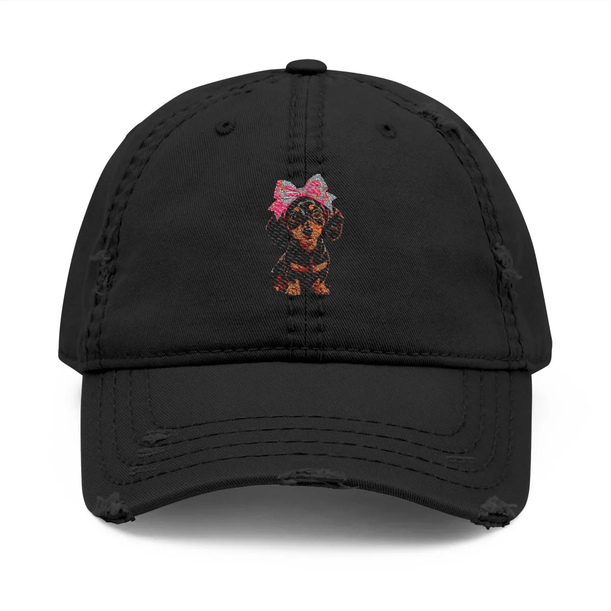 Luna wearing a small bow — the illustration embroidered on this cap