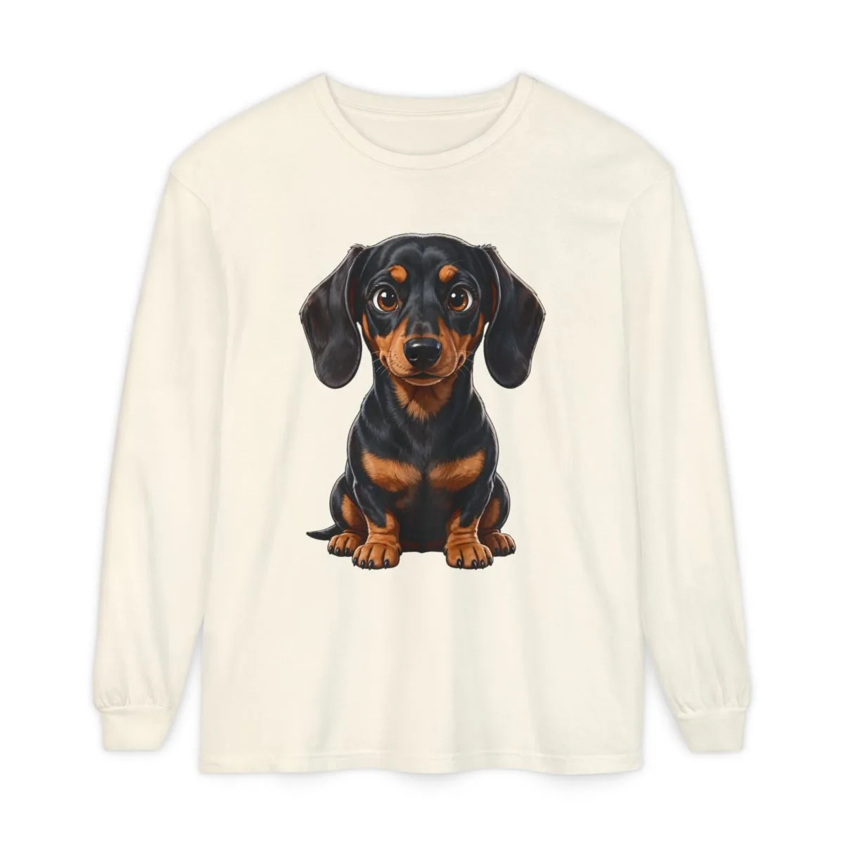 Luna sitting up, printed on a garment-dyed long-sleeve tee