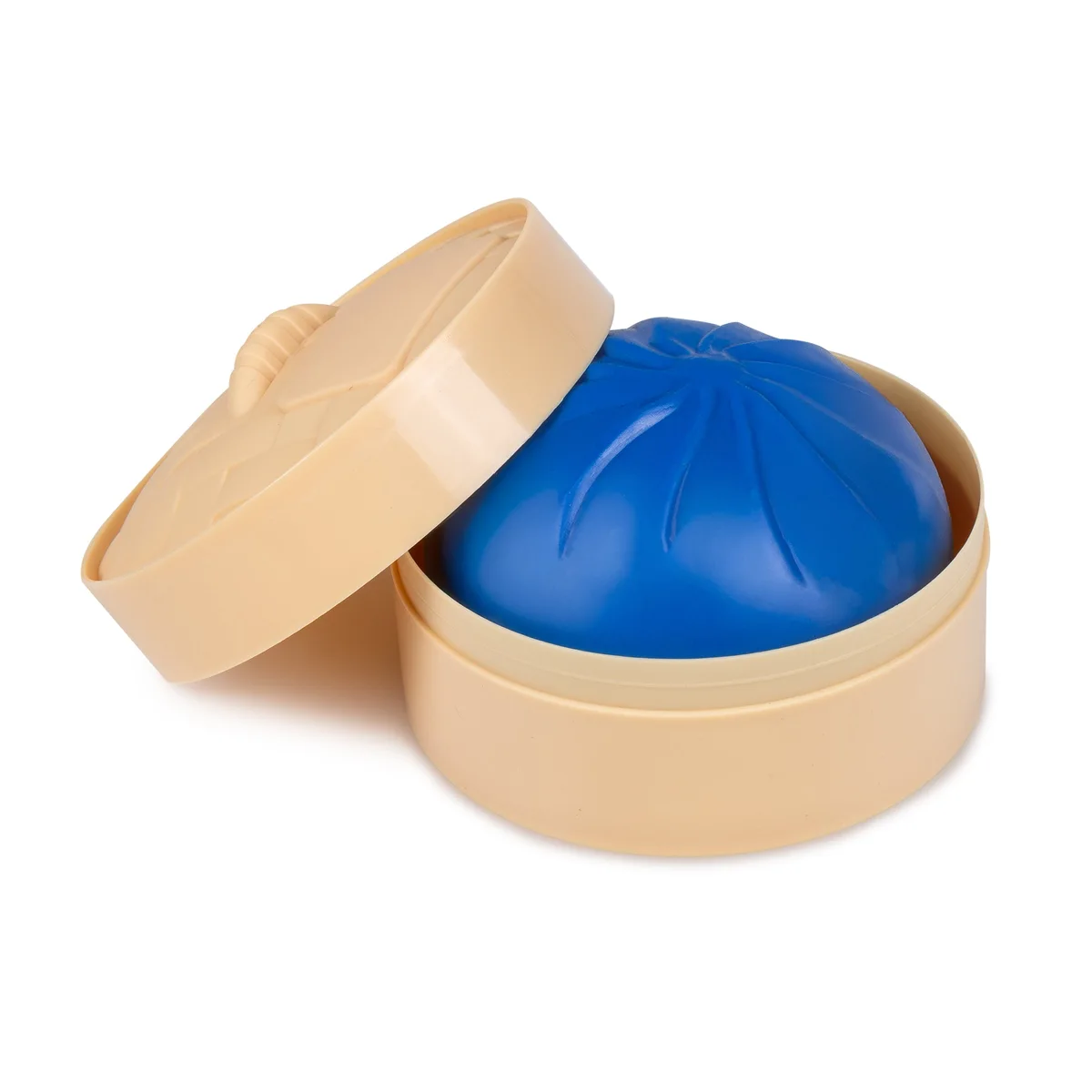 Supplier photograph: the blue dumpling inside its steamer-basket box